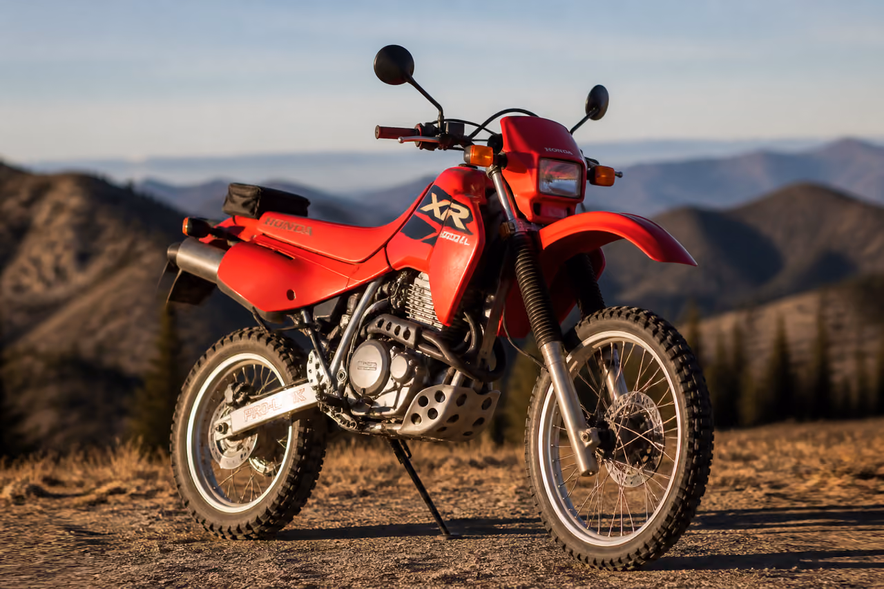 Red Honda Xr650l Dual Sport Motorcycle on Mountain Trail