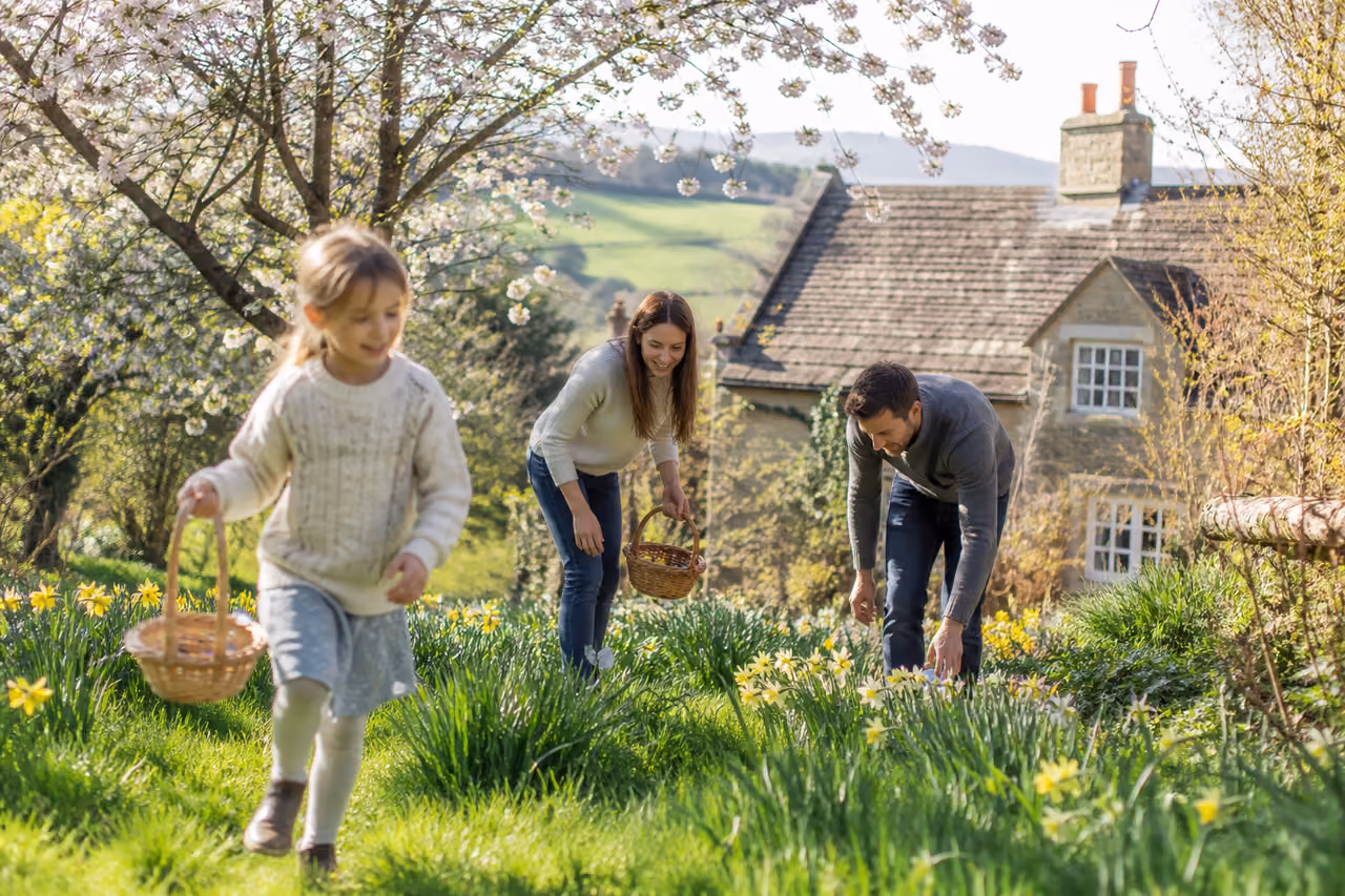 Family Searching for Easter Eggs in Warwickshire Countryside