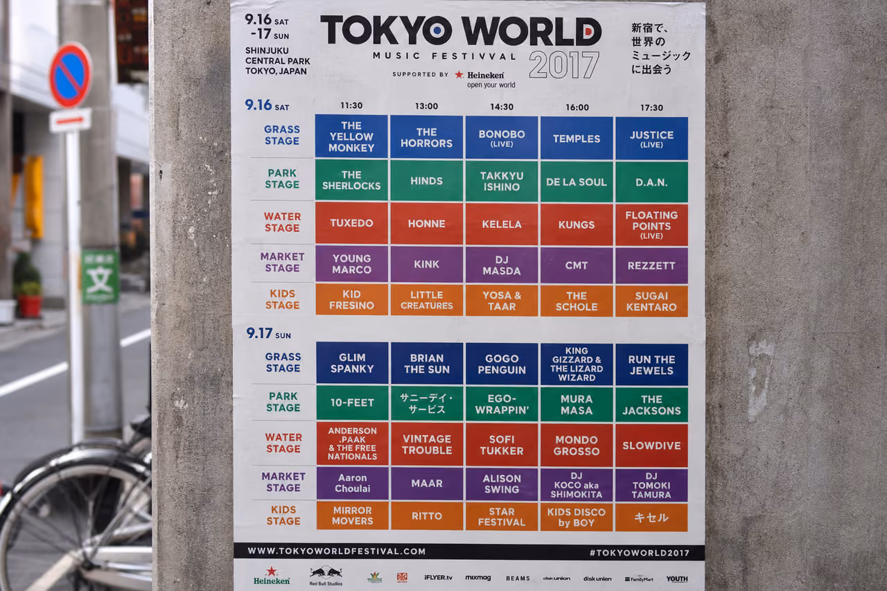 Music Festival Lineup Poster on a Tokyo City Wall