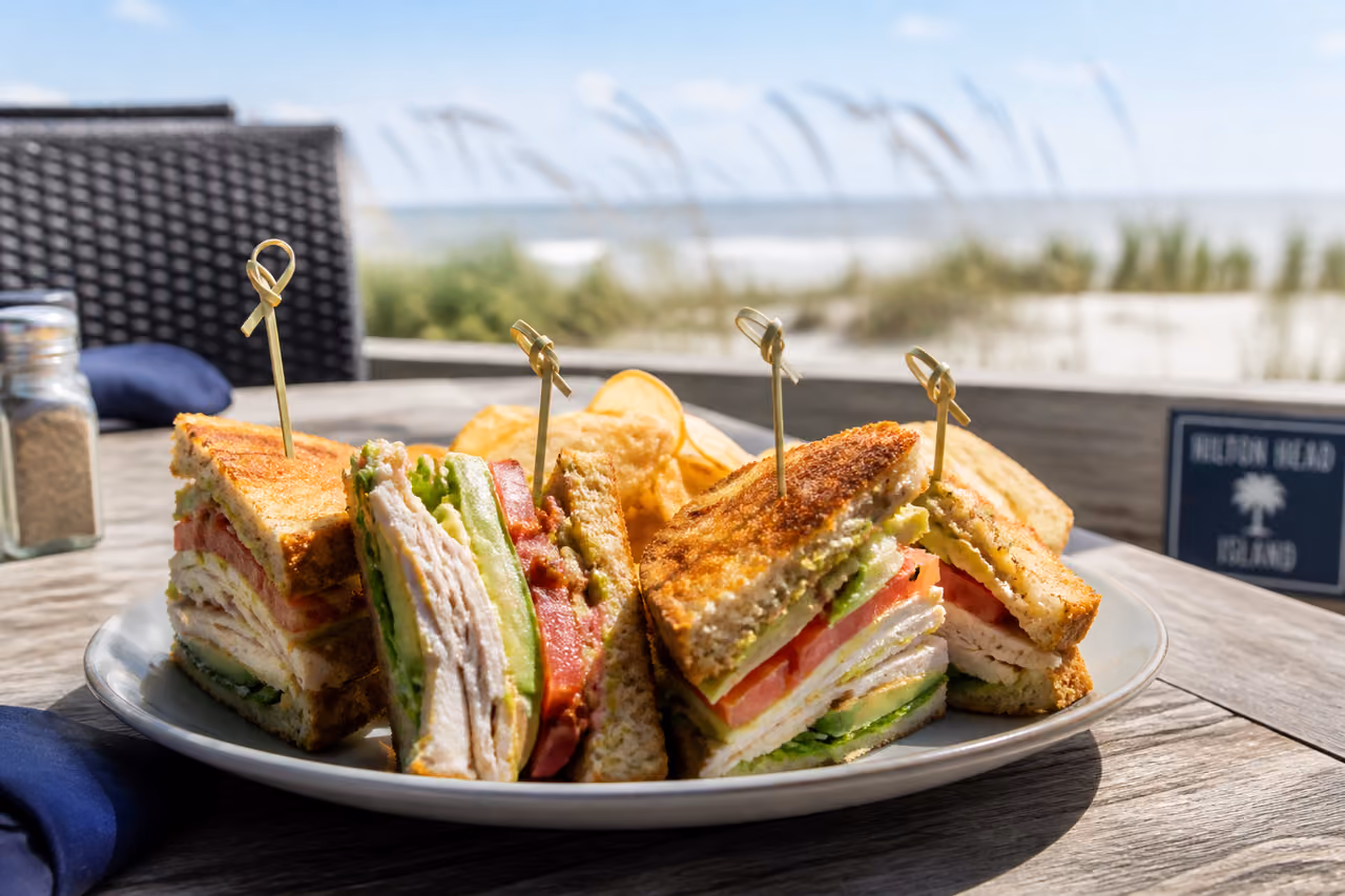 Gourmet Club Sandwiches Served at a Coastal Beach Cafe