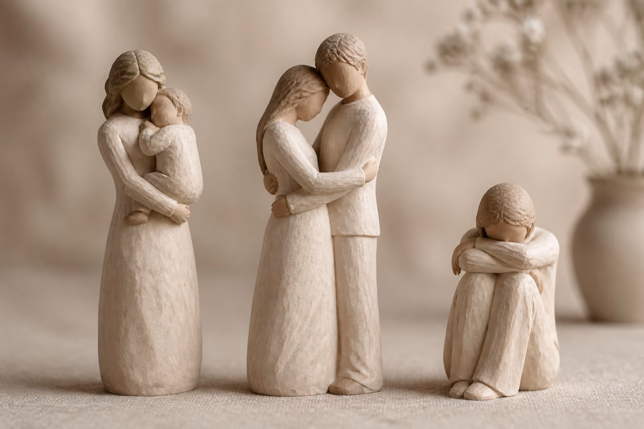 Minimalist Faceless Figurines Arranged on a Linen Surface