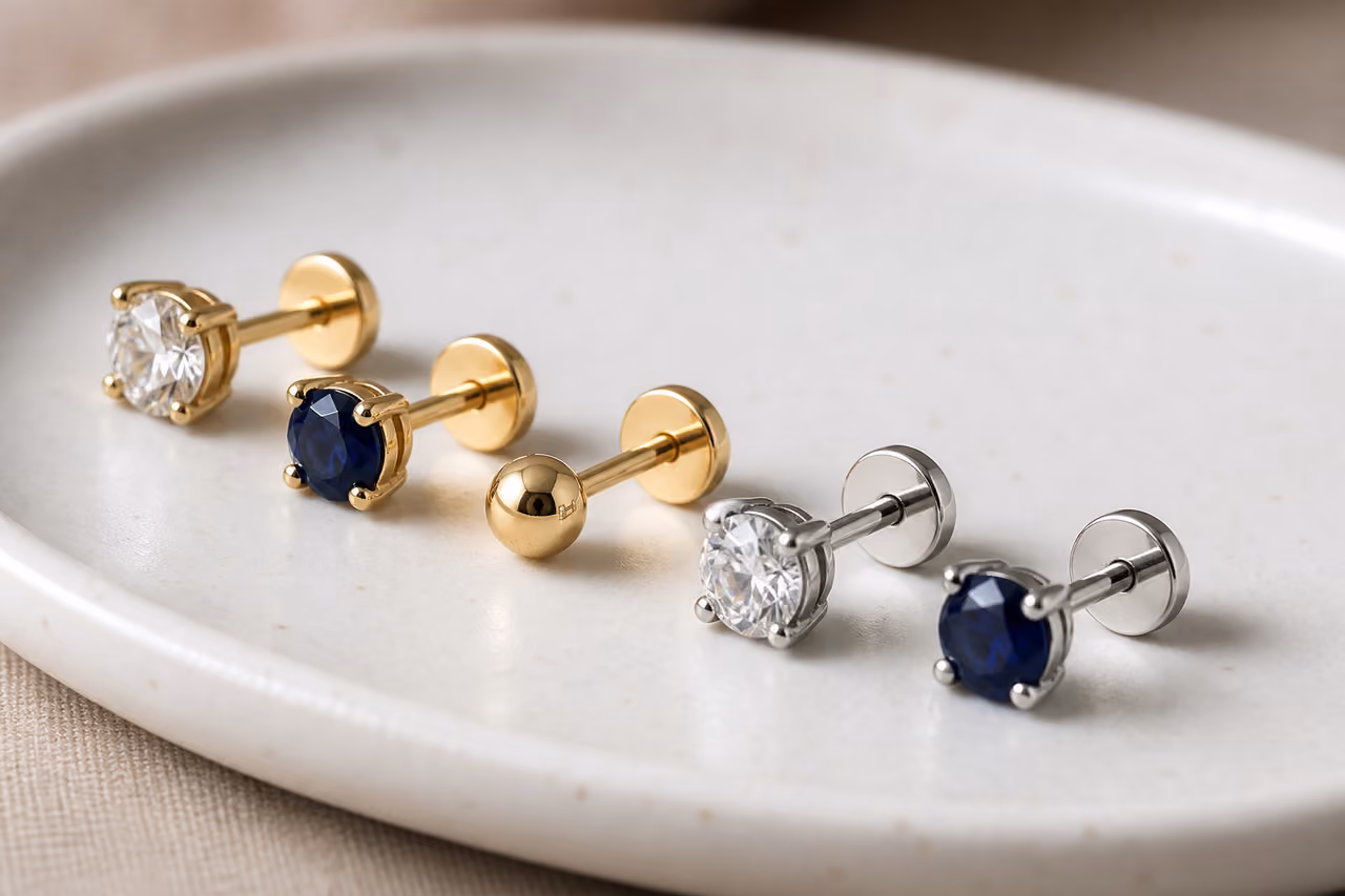 Threadless Push Back Earrings on a White Ceramic Tray