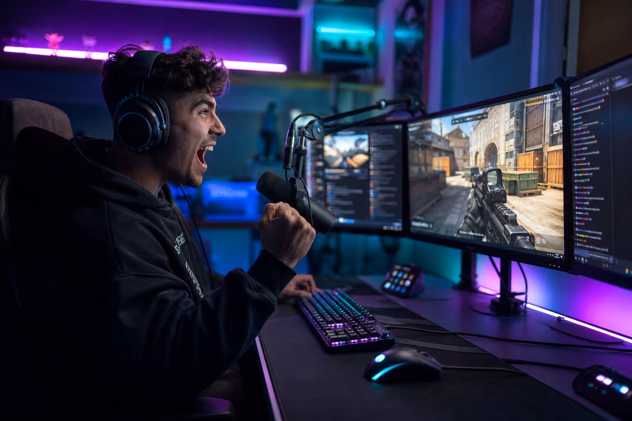 Excited Gamer Streaming Live in a Neon Lit Studio