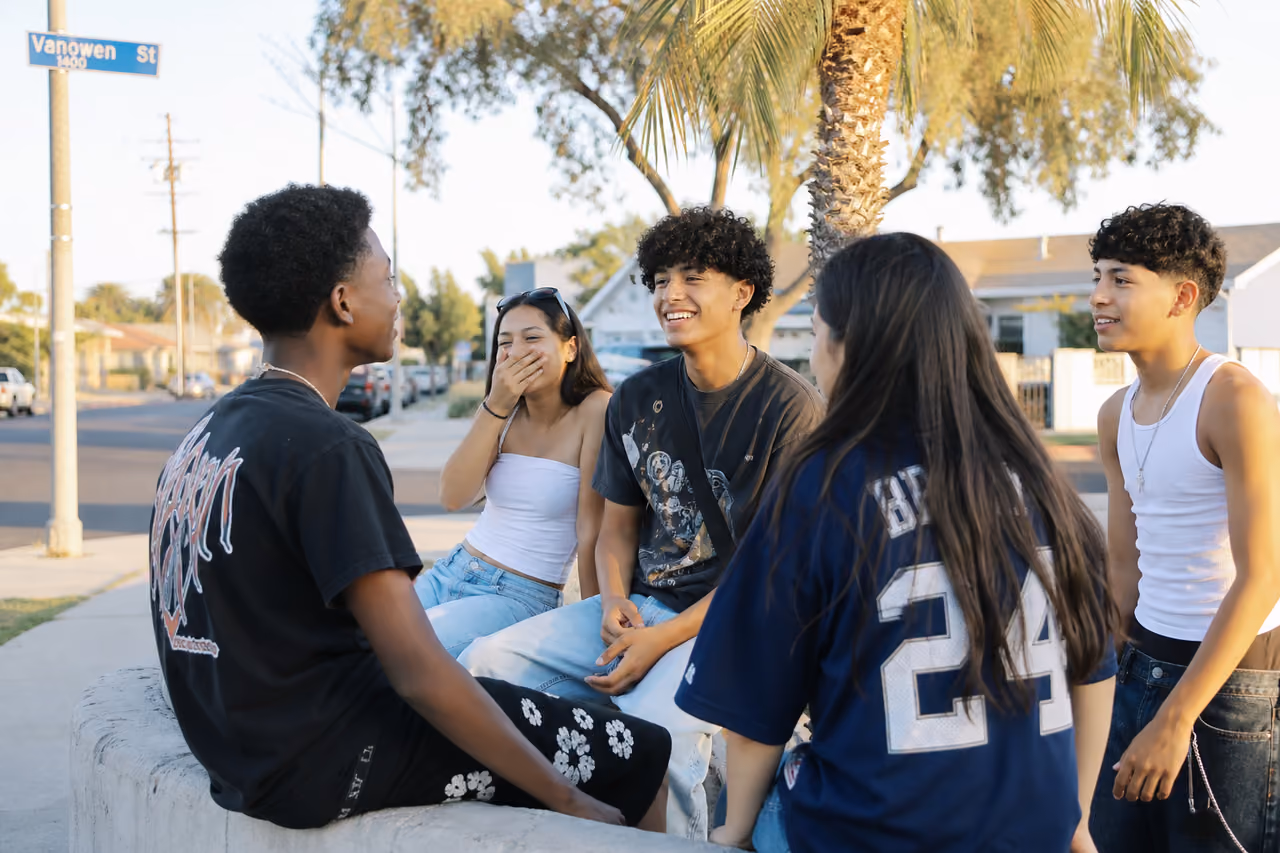 Diverse Group of Teens and Kids Socializing in Van Nuys