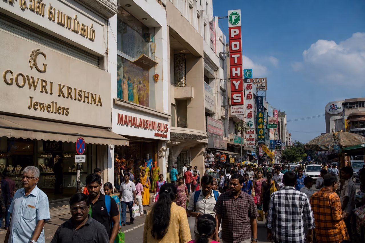 People Shopping Along a Busy Commercial Street in Gandhipuram
