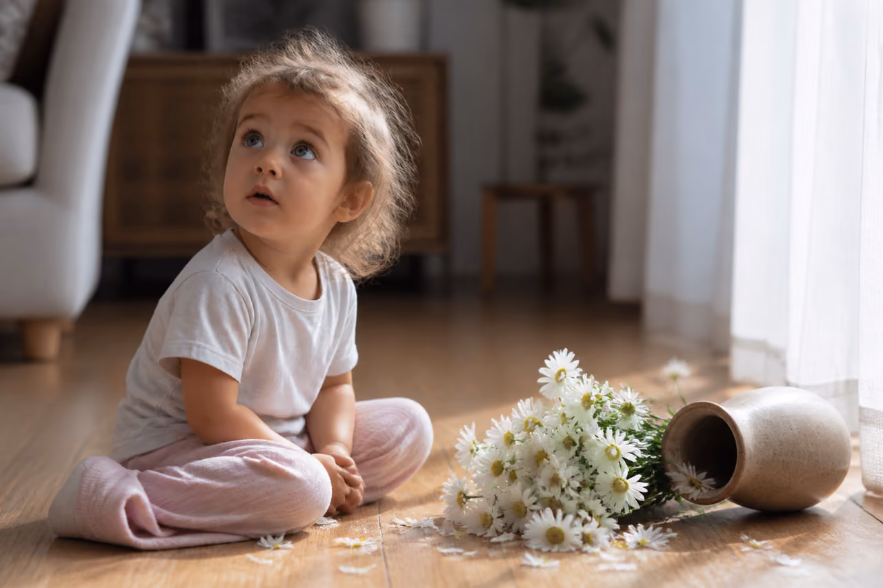 Young Child Looking Up with a Guileless Expression