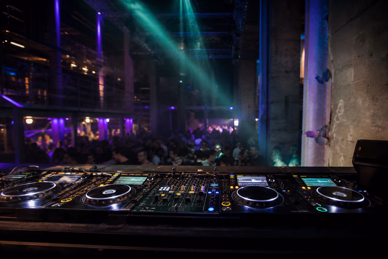 Dj Performing Tech House in an Amsterdam Warehouse Club