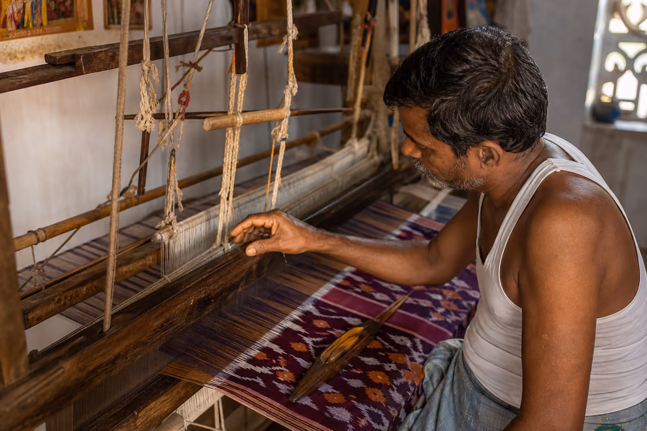 Artisan Weaving a Traditional Saree on a Handloom in Telangana