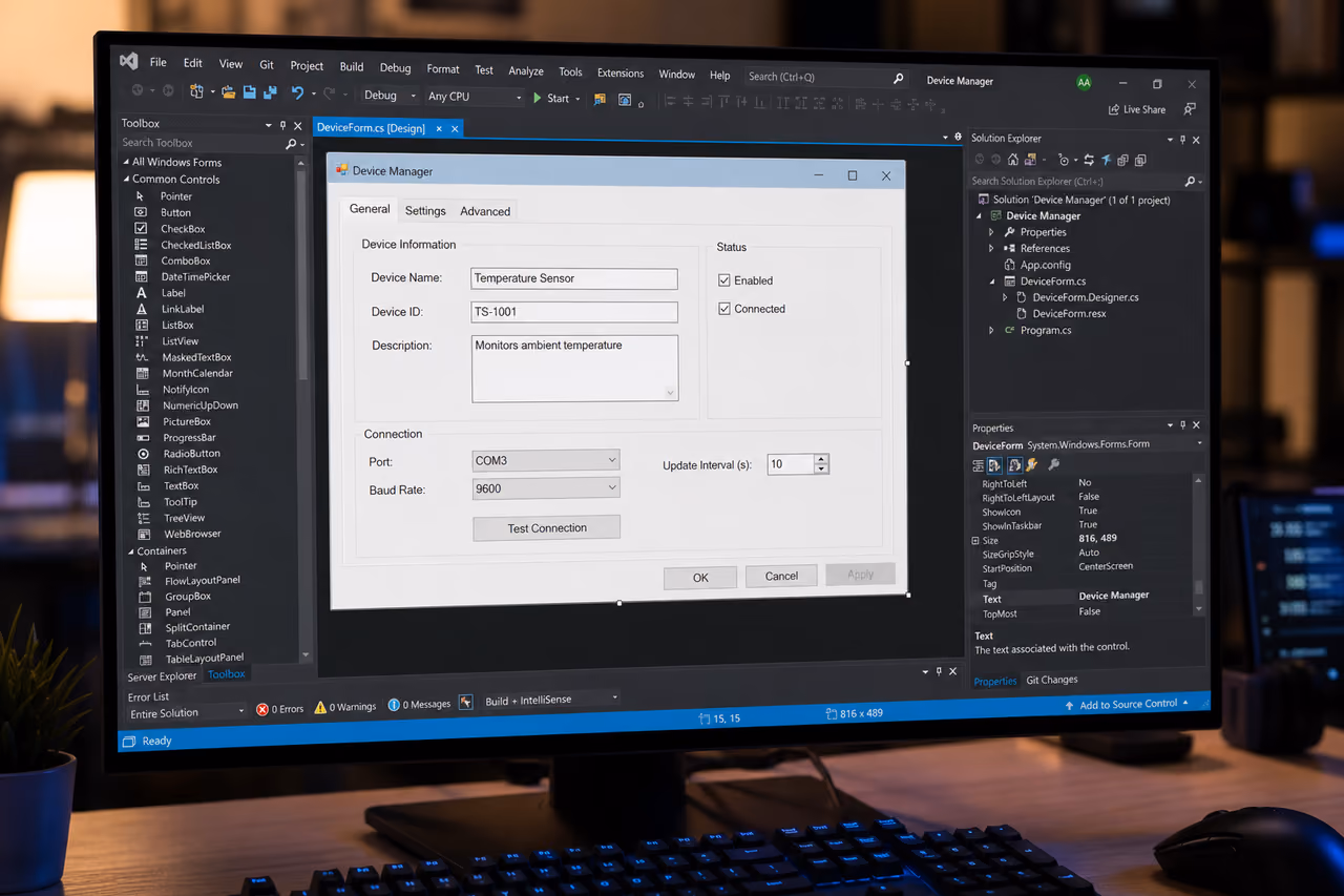 Software Developer Designing a Winforms Tab Control on a Monitor