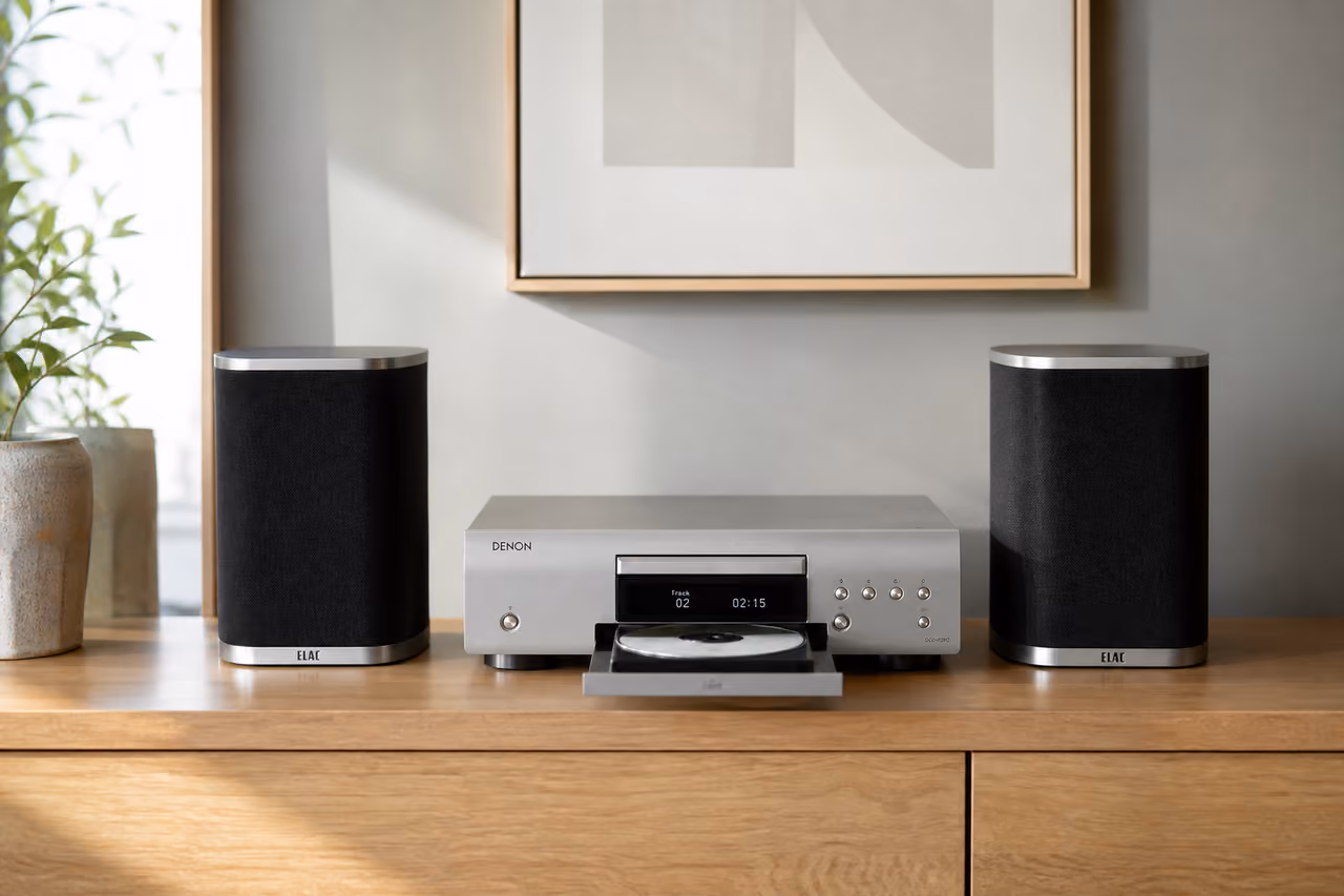 Modern Cd Player with Matching Bookshelf Speakers on Wooden Sideboard