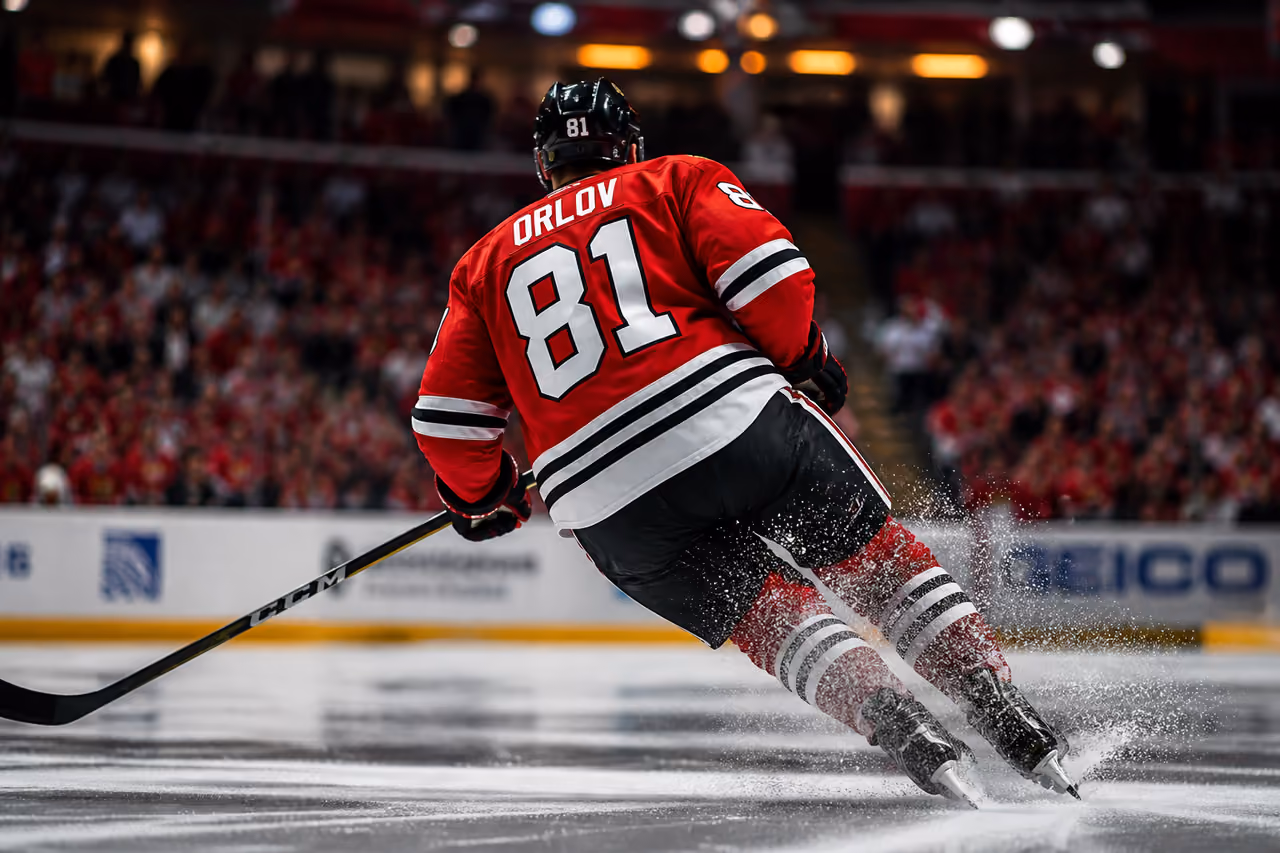 Hockey Player in Red Jersey Skating on Ice Rink