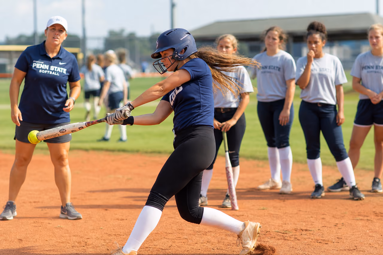 Teenage Athletes Training at a College Softball Camp