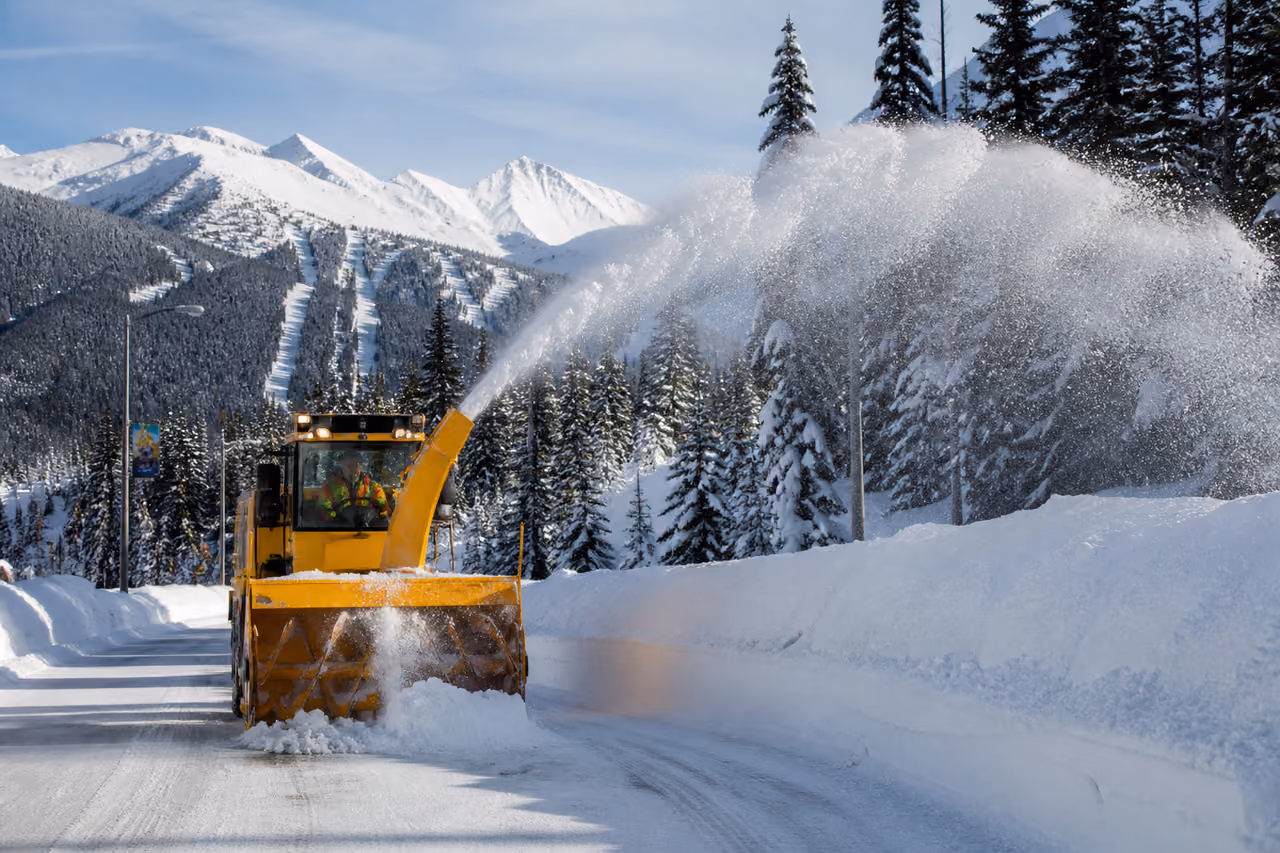 Industrial Snow Blower Clearing a Road in Whistler