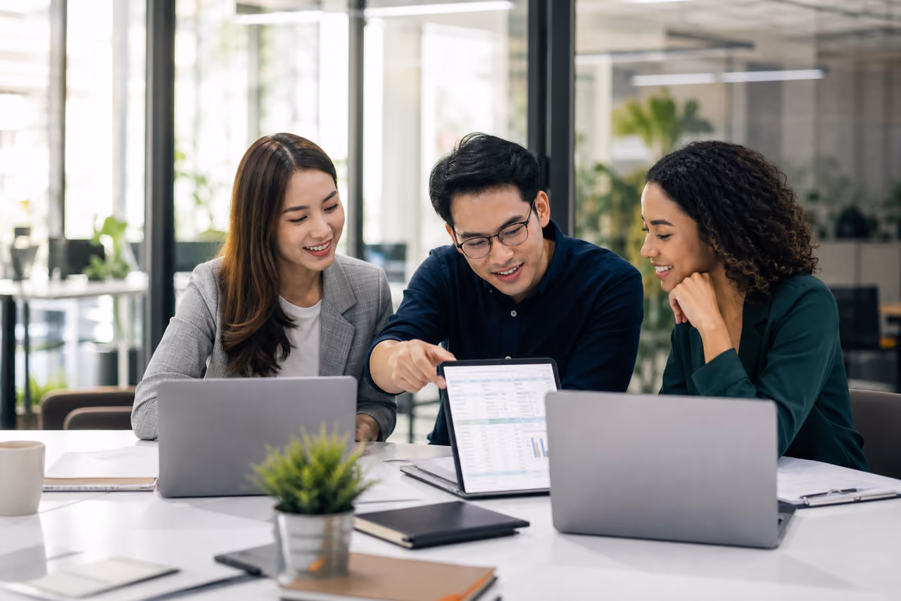 Diverse Accountants Collaborating in a Modern Office Setting