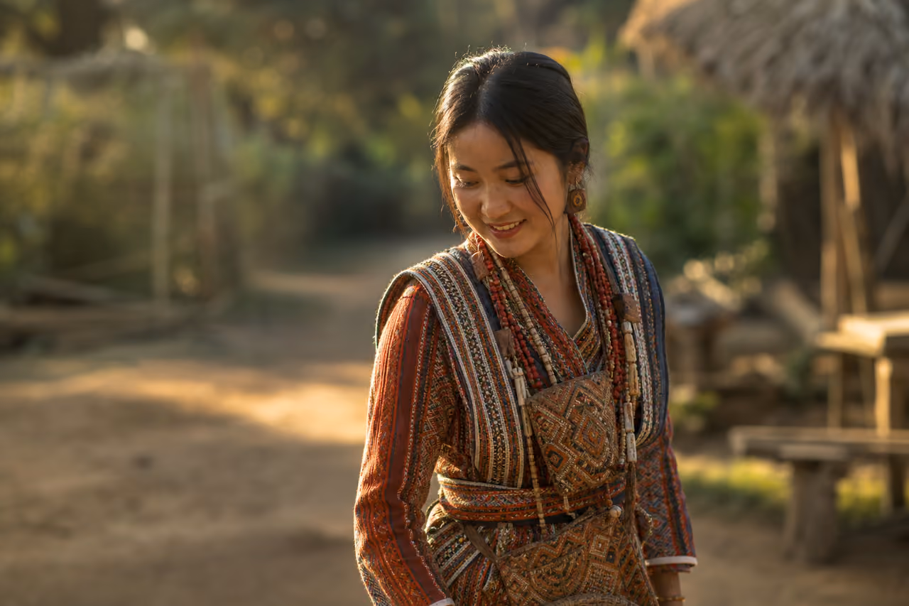 Person Wearing Intricate Traditional Tribal Clothes in Rural Village