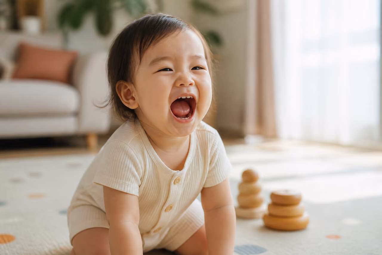 Joyful Toddler Squealing with Excitement in a Bright Living Room