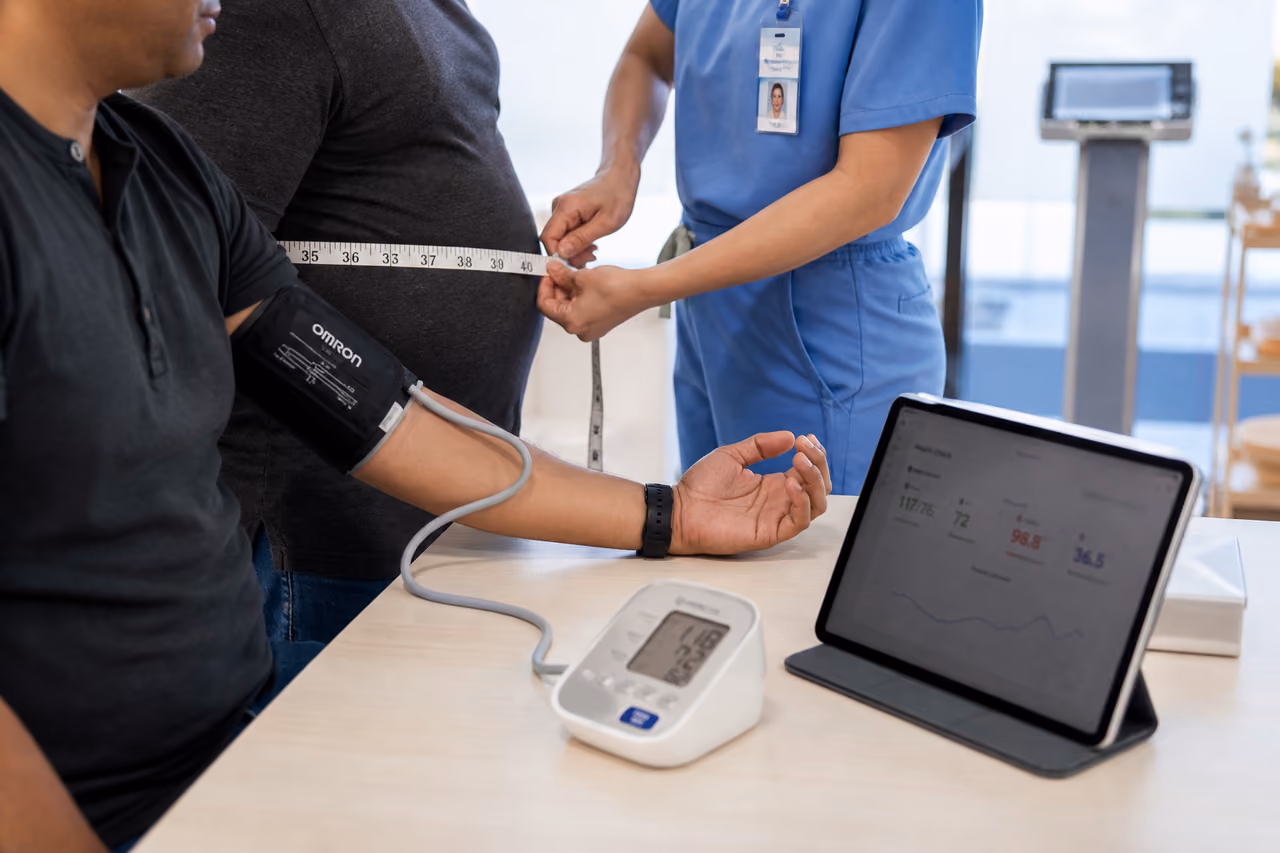 Healthcare Professional Performing Biometrics Screenings in a Clinic