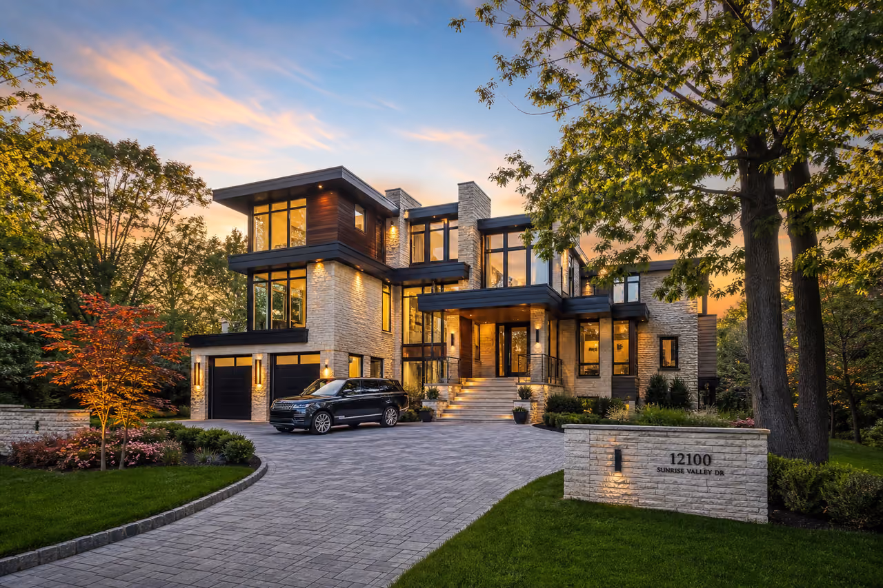 Modern Luxury Home Exterior at 12100 Sunrise Valley Dr