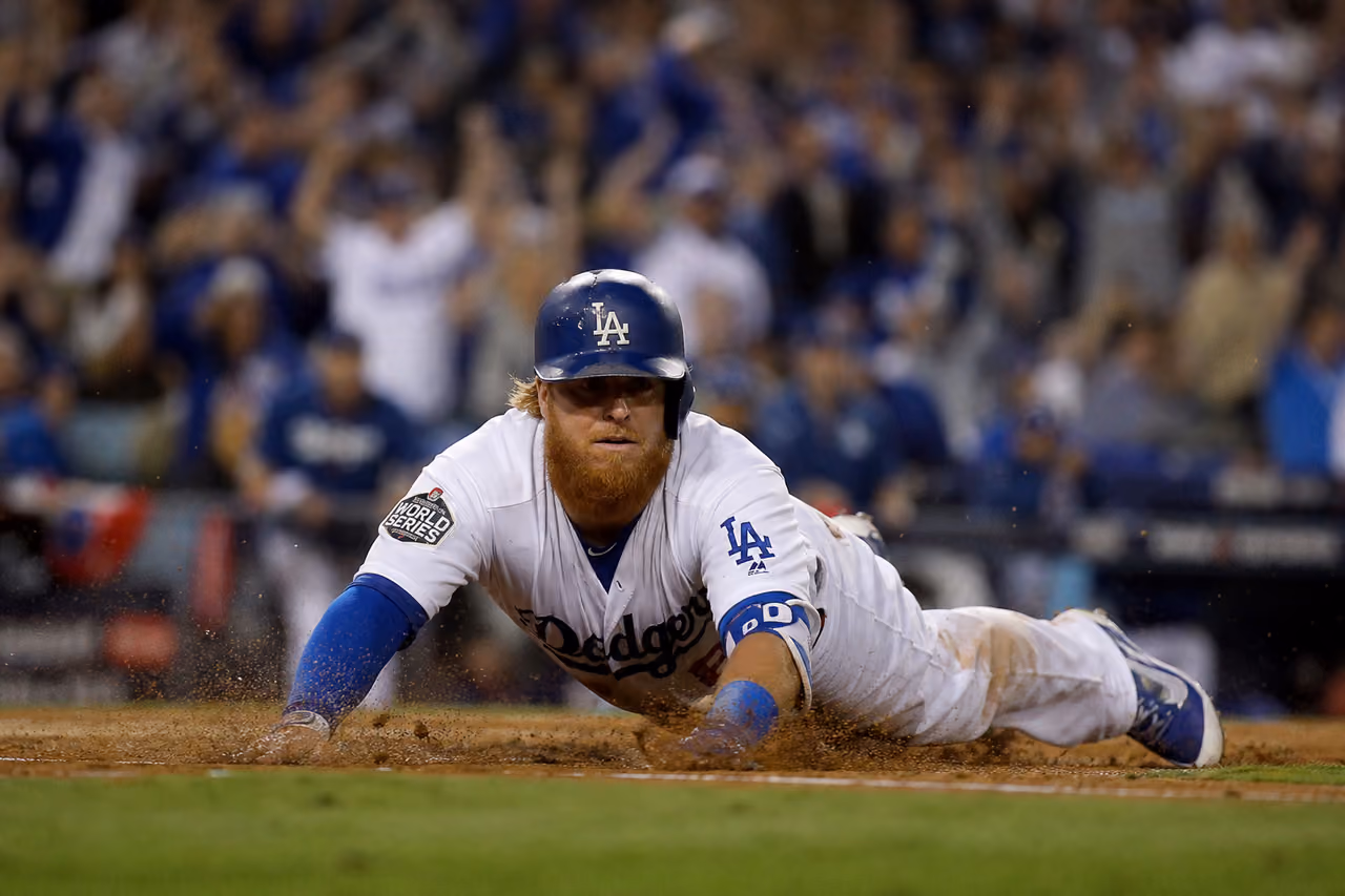 Professional Baseball Player Sliding Into Home Plate