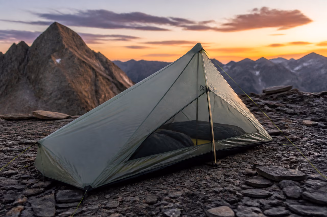 Compact Ultralight Tent Pitched on Alpine Mountain Plateau
