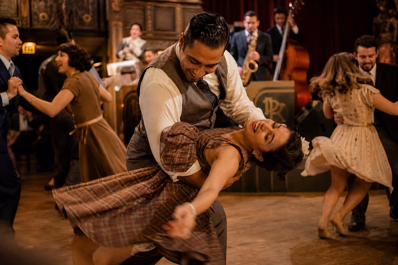 Couple Performing a Dynamic Dip at Swing Dance Events