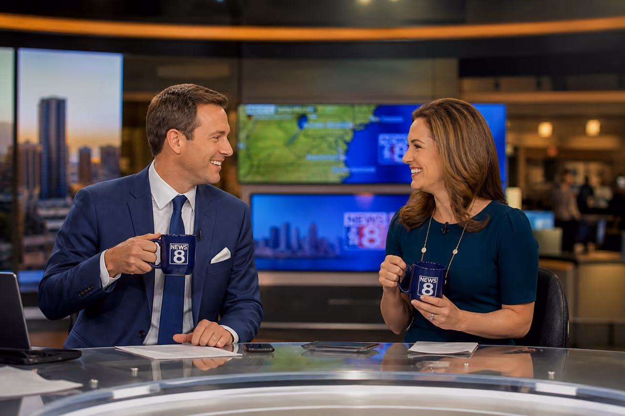 News Anchors Chatting During a Morning Break in Studio