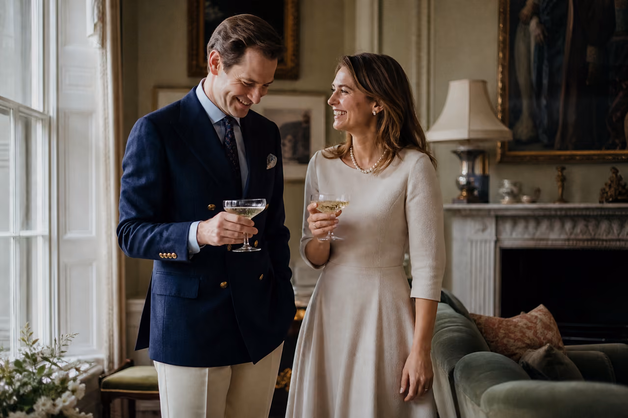 Sophisticated Couple Sharing Champagne in a Traditional English Drawing Room