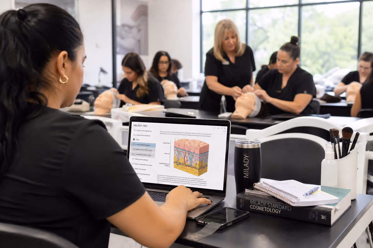 Cosmetology Student Using Milady Pro Online Platform in Classroom
