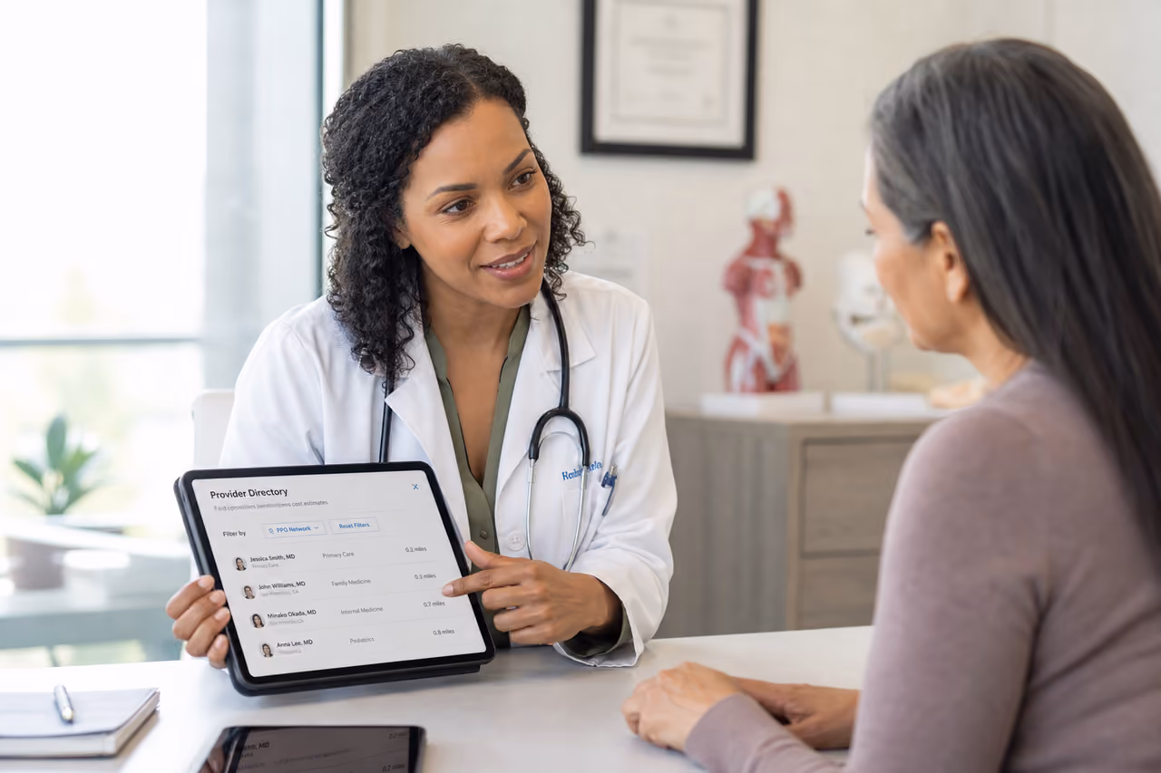 Doctor Showing Ppo Provider Directory to Patient on Tablet