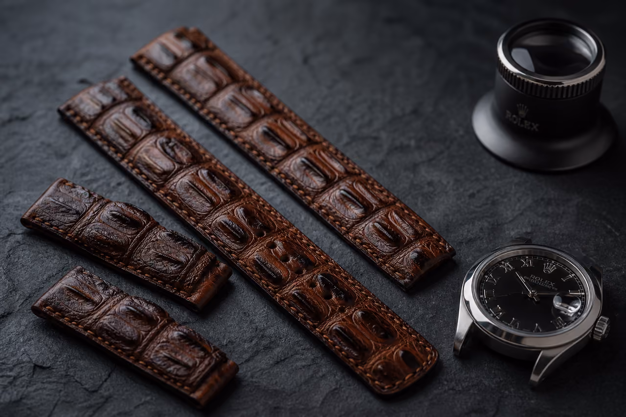 Hornback Crocodile Watch Straps on Dark Slate Surface