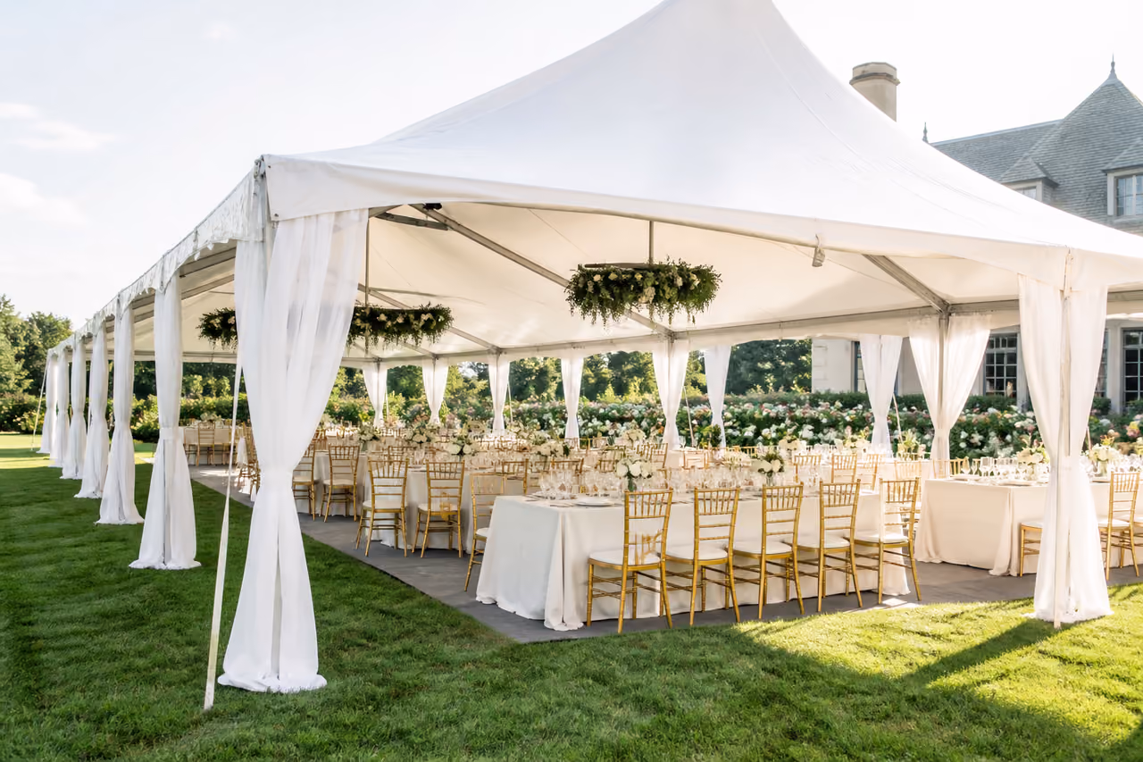 Large White Event Marquee Set Up on Luxury Estate Lawn