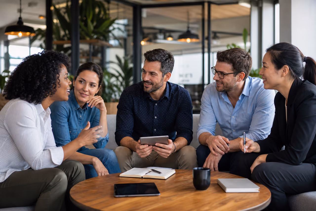 Diverse Business Team Discussing Professional Values in Modern Office