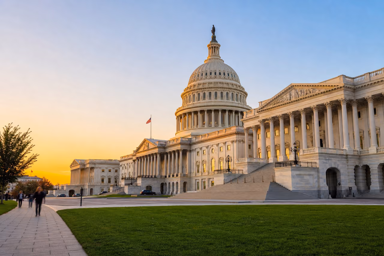 United States Capitol Building Under a Golden Sunset Sky