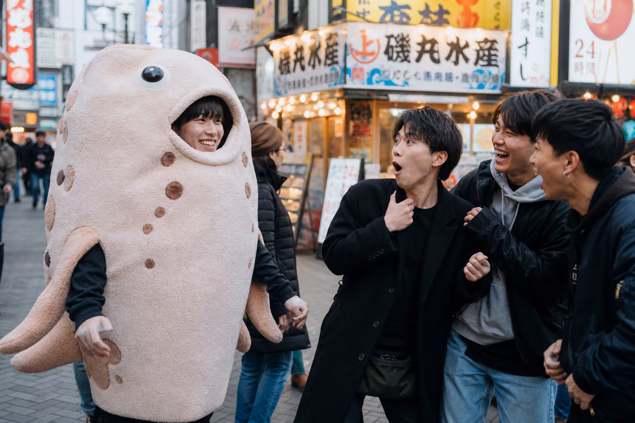 Man in Giant Costume Surprising Friends on Tokyo Street