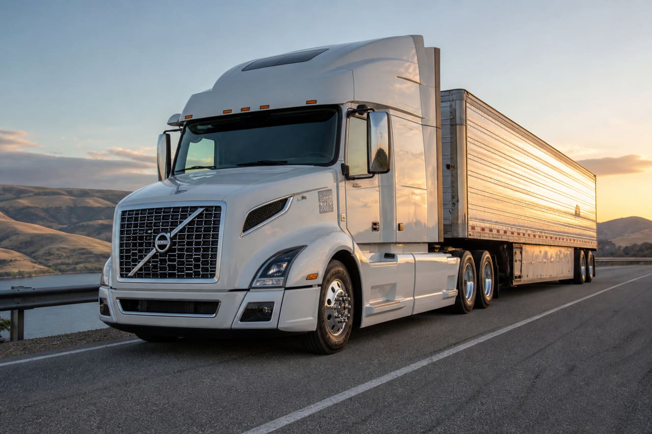 White 2016 Volvo Truck Parked on Scenic Highway