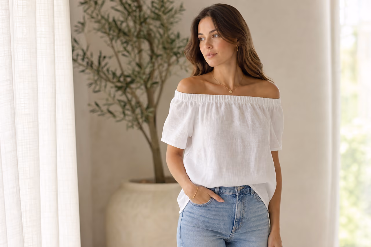Woman Wearing a White Off the Shoulder Short Sleeve Top