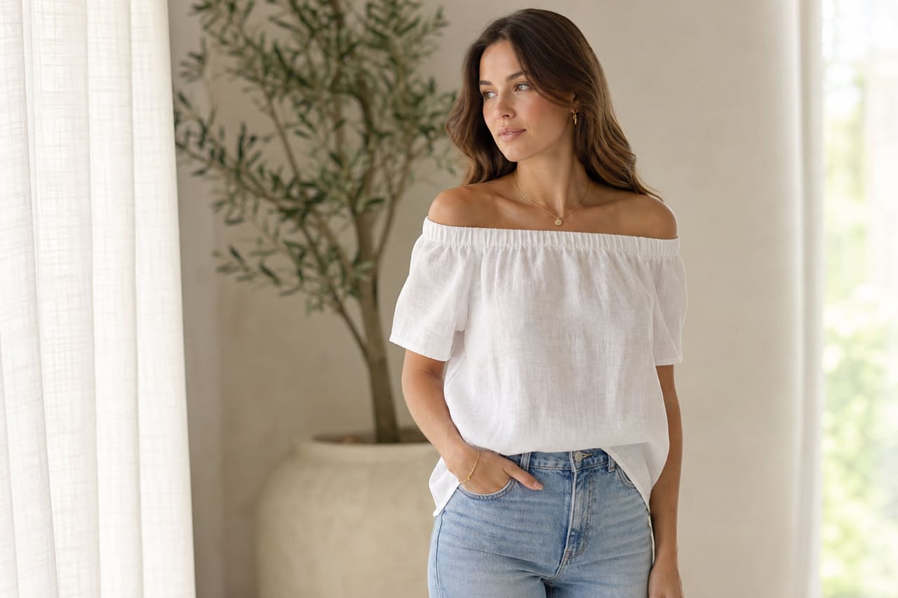 Woman Wearing a White Off the Shoulder Short Sleeve Top